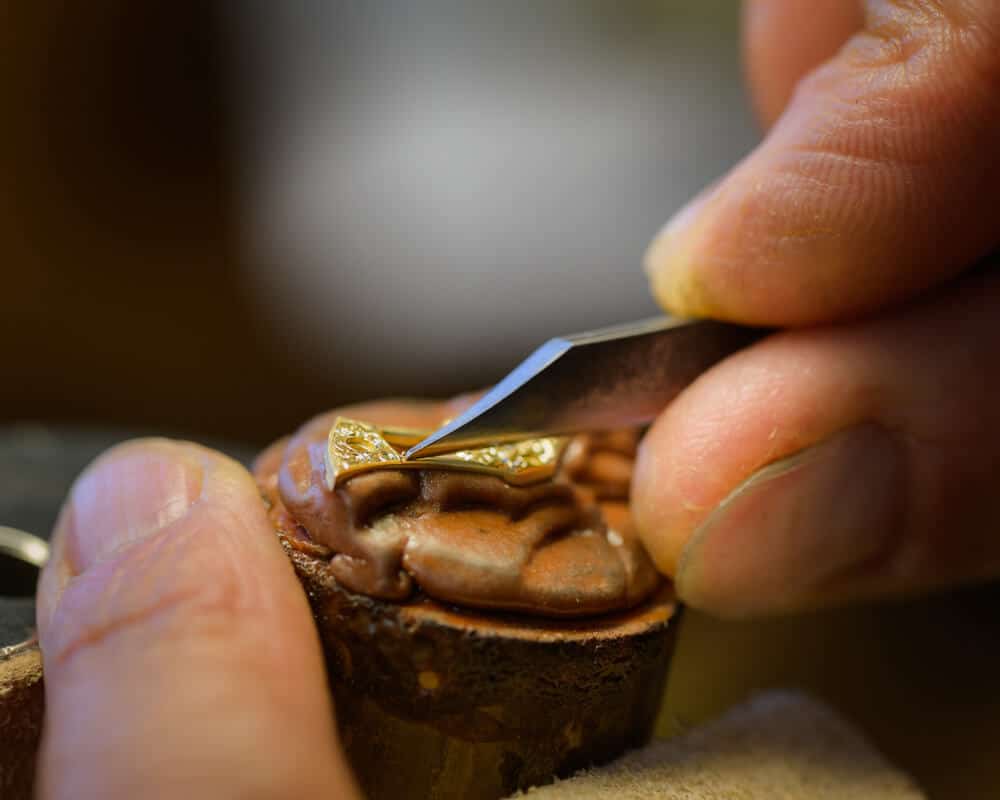 Arnold & Son hand engraving with a burin